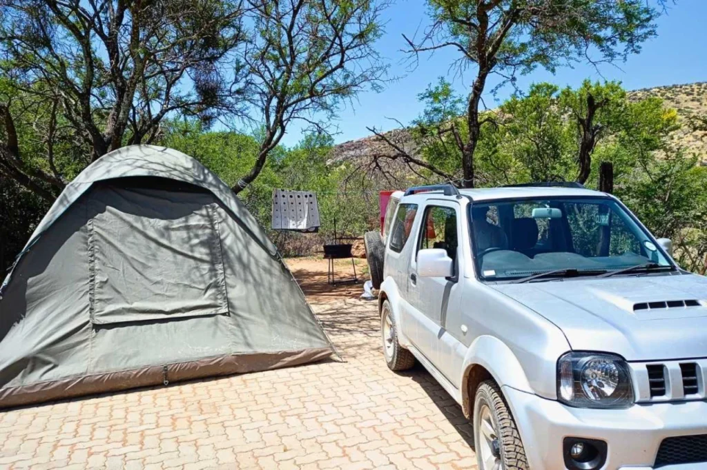 Campsite at Mountain Zebra National Park with tents and mountain views